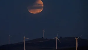 A lunar eclipse turns the Moon red near the Australian capital city of Canberra on March 14, 2025. 