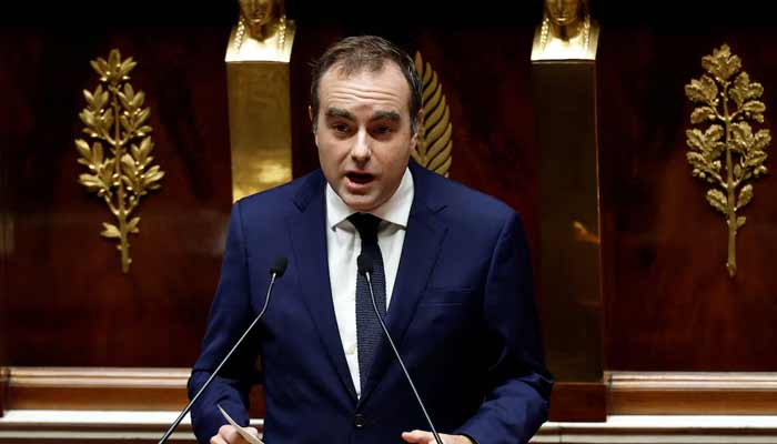 French PM survives no-confidence votes after making pension concession